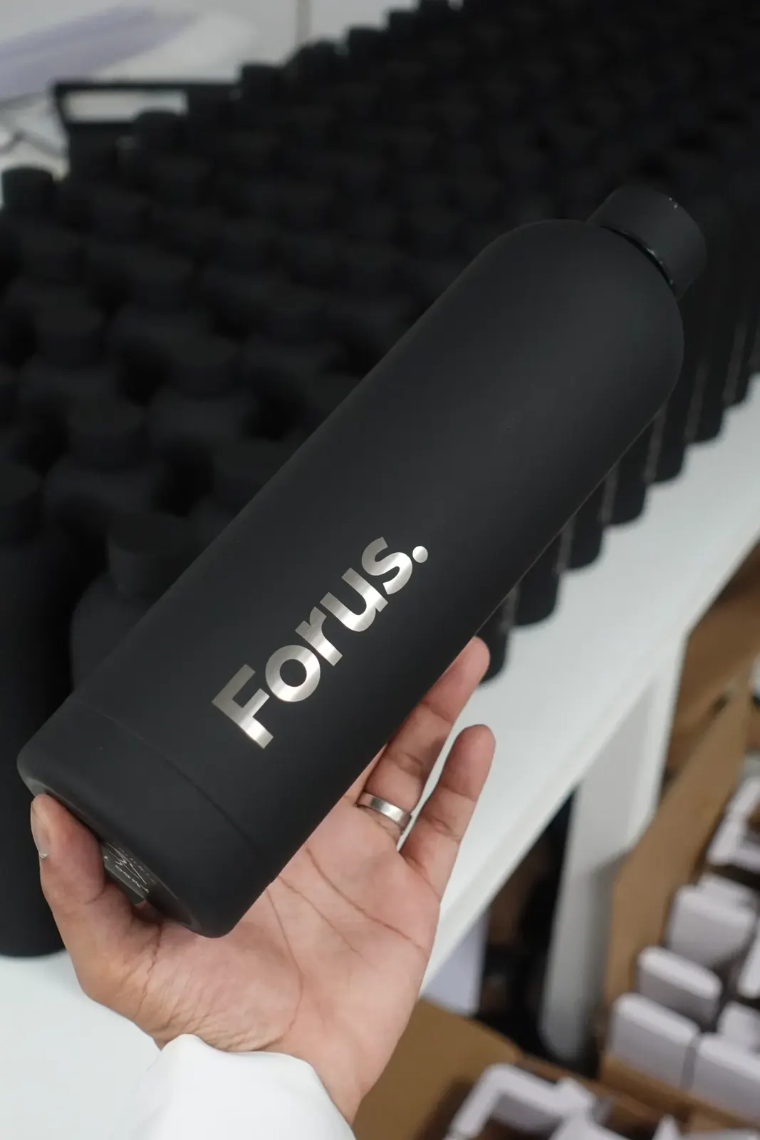 Black stainless flask with engraved logo