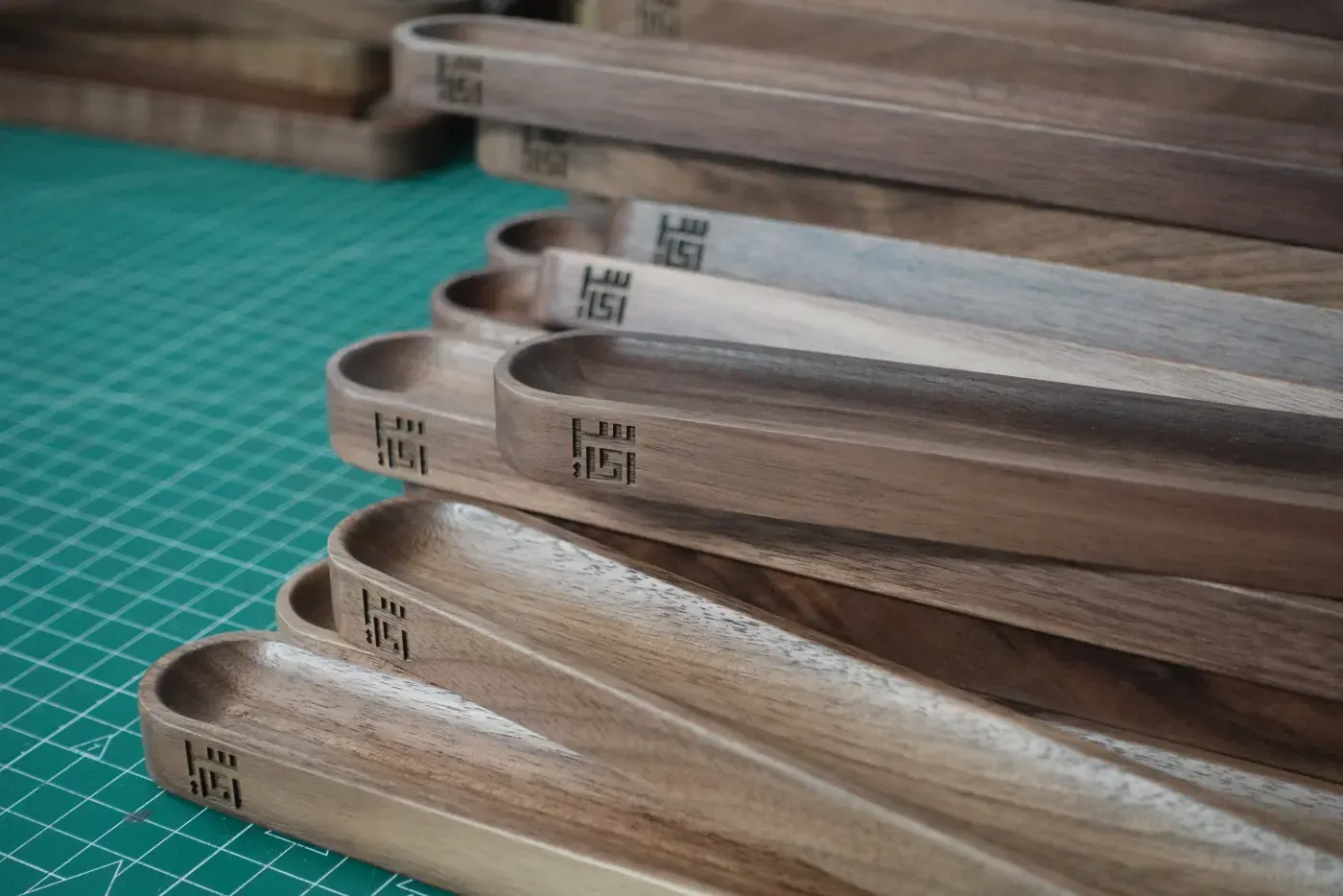 Laser engraved logos on wooden trays